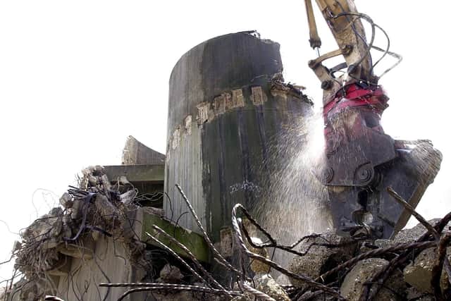 Down she comes - the remains of the Tricorn in June 2004.