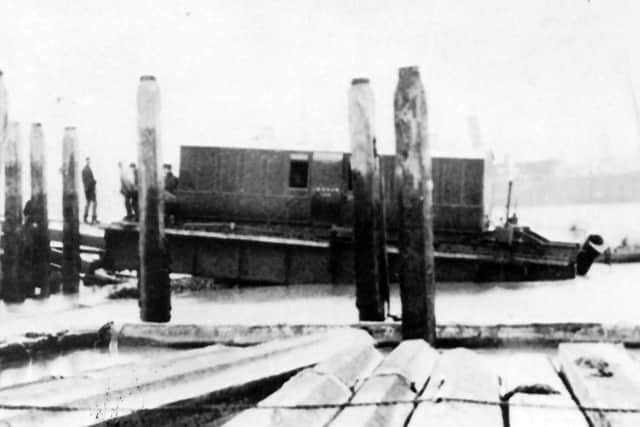 Railway carriage on bombed railway viaduct? A fascinating photograph believed to show a railway carriage on part of the viaduct to the South Railway Jetty after bombing. Picture: Barry Cox