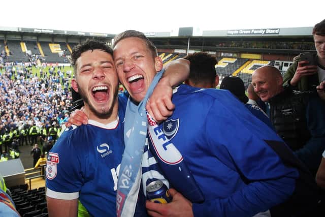 Conor Chaplin celebrates promotion at New Meadow with Carl Baker. Picture: Joe Pepler