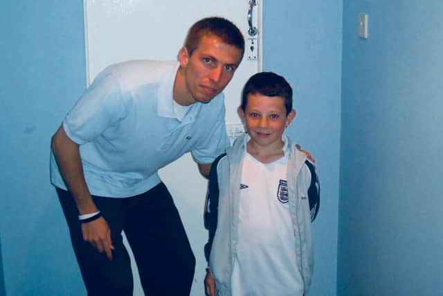 Conor Chaplin poses with Gary O'Neil after signing for Pompey as a nine-year-old