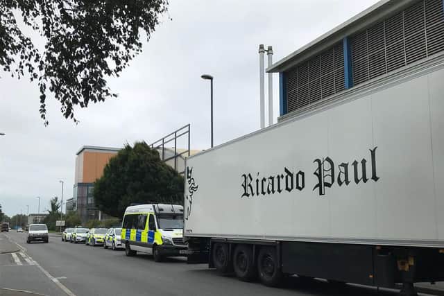 Police at the scene in Quartremaine Road in Portsmouth. Picture: Byron Melton