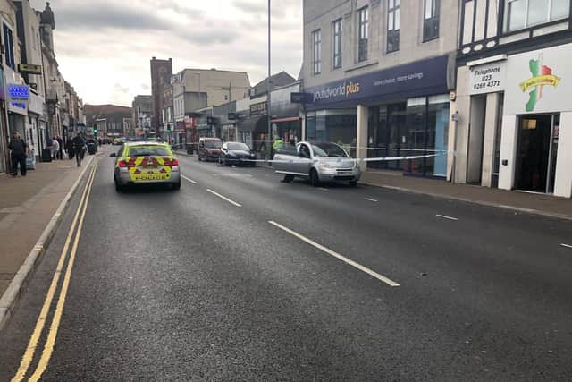 Police at the scene in London Road earlier today.
