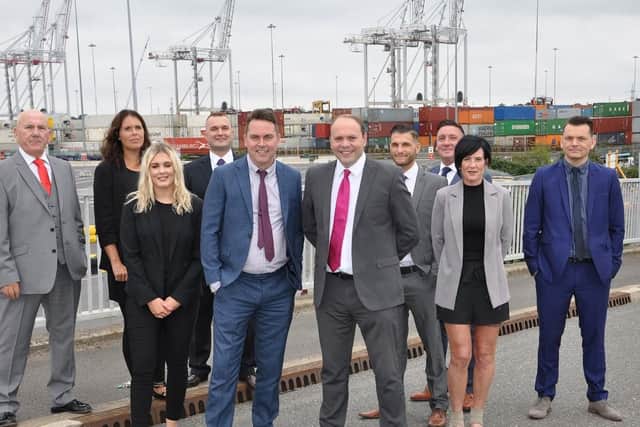 Lee Gamble, MD of Berry Recruitment, centre left, and branch manager Andy Price