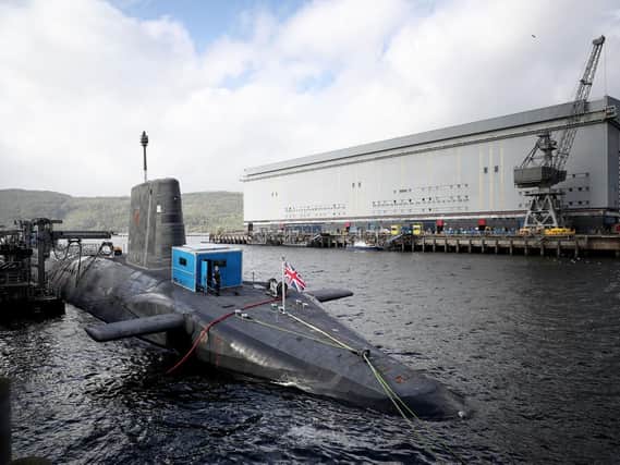 The Vanguard-class nuclear deterrent submarine HMS Vengeance at HM Naval Base Clyde, Faslane, the infrastructure for supporting the Royal Navy's fleet of nuclear submarines is no longer 'fit for purpose', MPs have warned. Photo: Press Association
