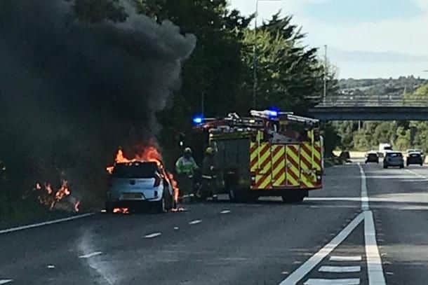Firefighters battle car blaze on A27 this afternoon. Picture: Hants Road Policing/ Twitter