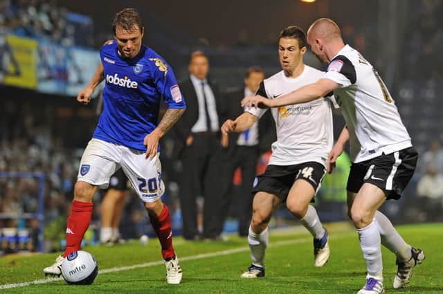 Bjorn Helge Riise in rare match action for Pompey after joining on loan in September 2011