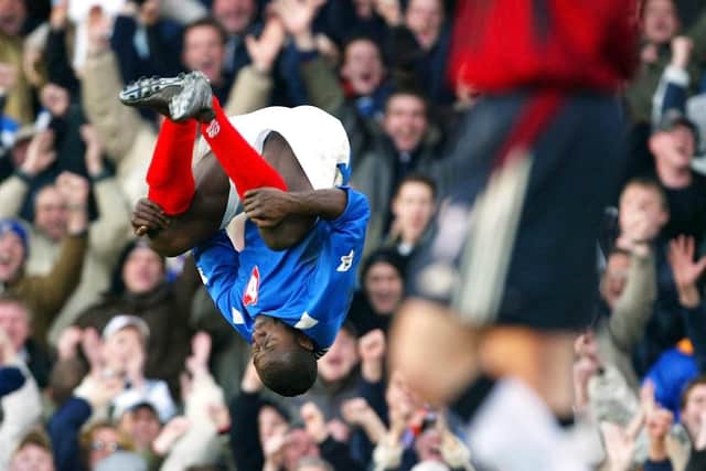Lomana Lualua scores against Newcastle in 2004. Picture: Mike Hewitt/Getty Images