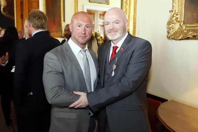 Terry Baker, left, was rescued by Stephen Chamberlain, right, in February. Together the pair attended the Merchant Navy Awards in London where Stephen received the Merchant Navy Medal for Meritorious Service for saving Terry's life. Picture: Mark Dalton