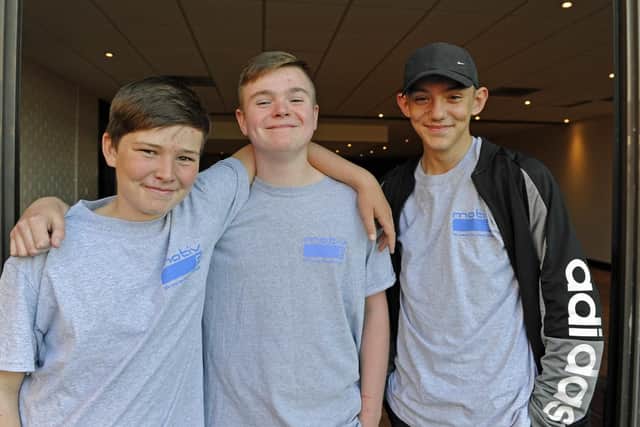 The youth support organisation Motiv8 celebrates its 20th anniversary at a reception held at the Mountbatten Centre, Portsmouth. (l to r), Jacob Rands (13), Louis Banks (14), and Cameron Starky (14).