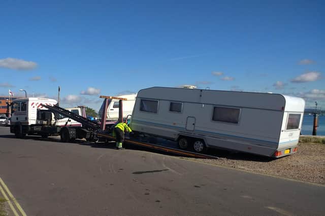 Contractors removing vehicles at Eastney on Wednesday. Picture: Portsmouth City Council