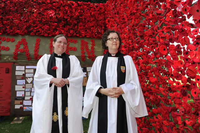 The Reverend Jenny Gaffin with The Archdeacon of Portsdown Joanne Grenfell. Picture Ian Hargreaves (181007-1_poppies)