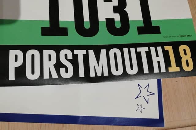 Portsmouth spelt wrong on a runner's number