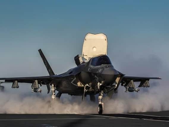 F-35 jets have dropped the first test bombs from HMS Queen Elizabeth. Picture: Royal Navy