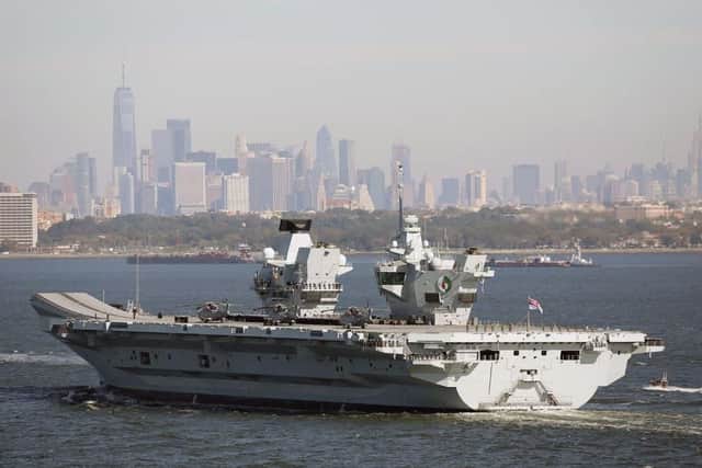 HMS Queen Elizabeth arrives in New York City - with Empire State Building just visible in far right corner. Picture: Royal Navy