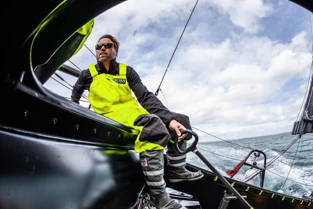 Alex Thomson at the helm of the new Hugo Boss vessel. Picture: Alex Thomson Racing