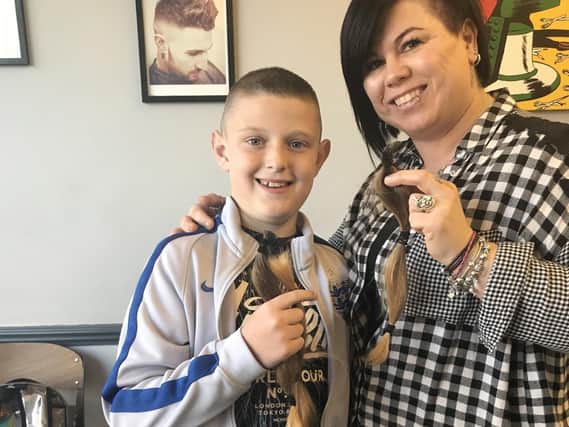 Oliver Parkhurst-Fisher before and after his haircut, left and right, with Pompey's Christian Burgess, pictured centre, and hairdresser 'Ange' from Scott's Barbers. Picture: Sally Parkhurst / Joe Pepler