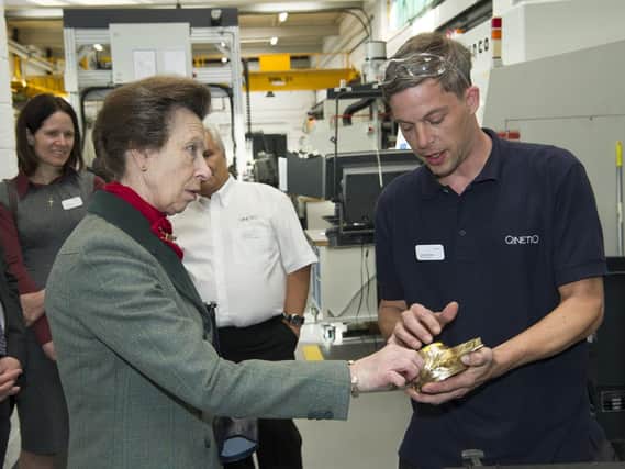 The Princess Royal meets technician Lee Bodenham at QinetiQ in Gosport on October 25.