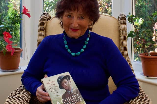 Sheila Renshaw with her new book