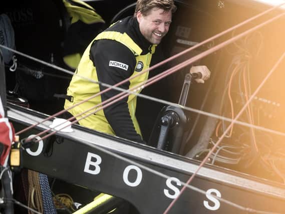 British yachtsman Alex Thomson pictured here in action onboard his IMOCA Open60 race yacht 'Hugo Boss' at the start of the race
Photo credit - Lloyd Images