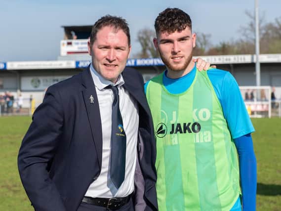 Former Pompey pair Lee Bradbury with his son Harvey have made Oxford United history. Picture: Vernon Nash