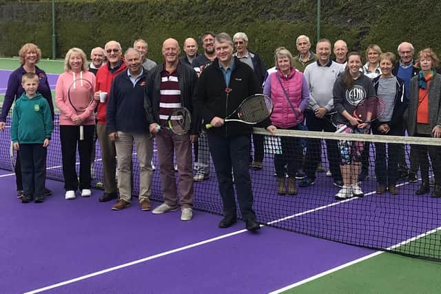 Warsash members gathered to celebrate the reopening of their courts which have been resurfaced and repainted in Wimbledon green and purple colours