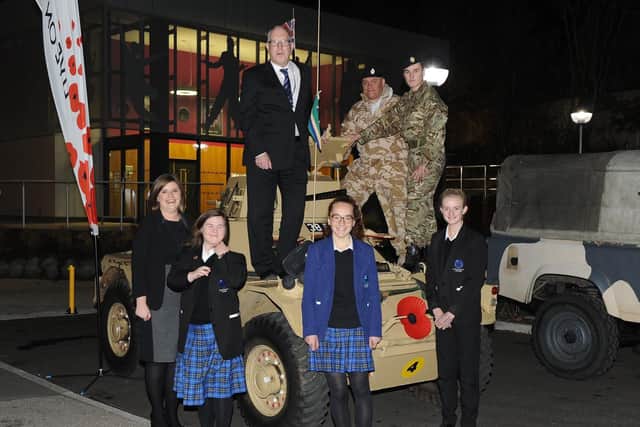 Head of history, Megan Thomas, Head Teacher, Kyle Jonathan, Evie Gallagher, Phoebe Reynolds 13, Nina Wallace 14, Max Grady 14, and Reggie Campbell on a Ferret Mark 2 5 tank