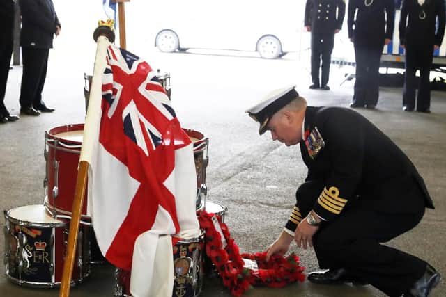 Captain Peter Towell OBE laying a wreath at HMS Sultan's Remembrance event. Photo: Royal Navy