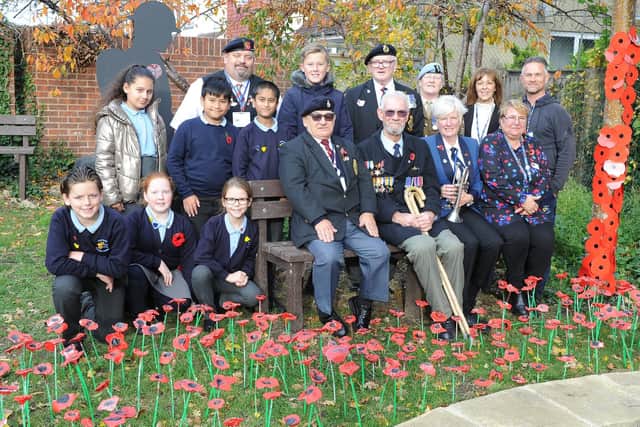 Pupils, veterans and curators near the poppy display.
Picture: Habibur Rahman