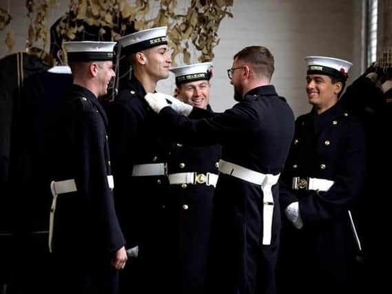 Royal Navy personnel doing remembrance events receive special coins commemorating the day. Picture: Royal Navy