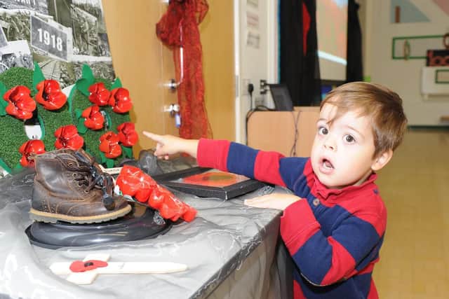 Teddy Stevens 3 looking at some of the ceramic exhibits. Picture : Habibur Rahman