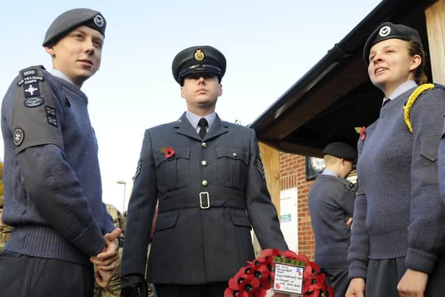 11/11/2018 Participants and onlookers prepare for the WW1 100th commemoration parade and service at Holy Trinity Church in Fareham. Air cadets prepare to lay a wreath.Picture Ian Hargreaves  (181111-1_remembrance_fare)