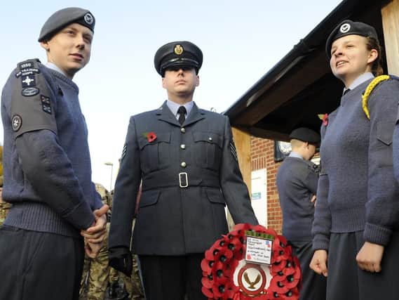 11/11/2018 

Participants and onlookers prepare for the WW1 100th commemoration parade and service at Holy Trinity Church in Fareham. Air cadets prepare to lay a wreath.
Picture Ian Hargreaves  (181111-1_remembrance_fare)