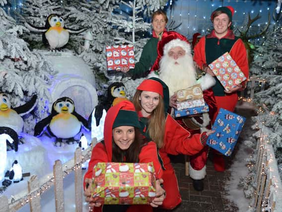 Santa and his team of helpers. Picture: Supplied