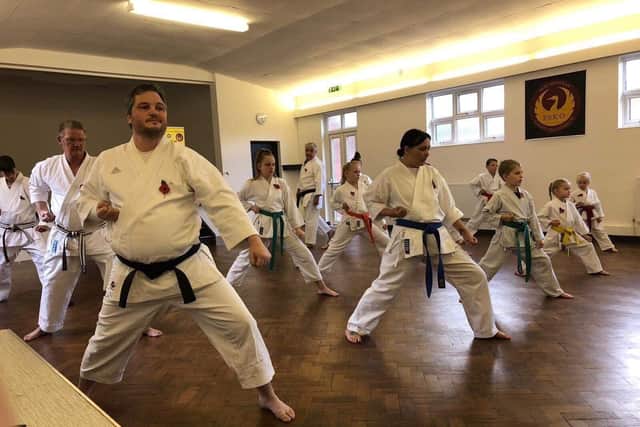 Karate students run through drills at PSKO Karate Havant during the Remembrance Sunday grading.