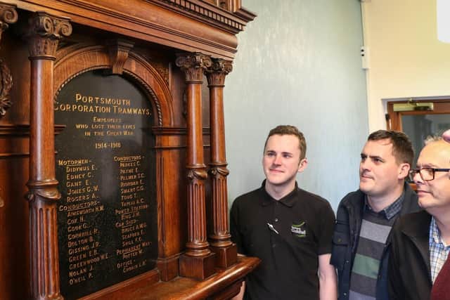 From left, Lee Willis from the Guildhall, James Daly from Portsmouth City Council's museums service, Nick Coles from the Guildhall, 
and Tim Gower from the museums service - all installed the memorial in its new position