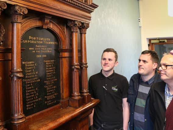 From left, Lee Willis from the Guildhall, James Daly from Portsmouth City Council's museums service, Nick Coles from the Guildhall, 
and Tim Gower from the museums service - all installed the memorial in its new position