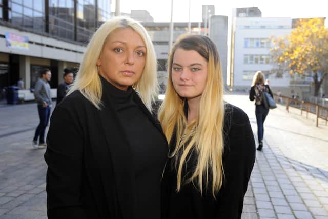Tommy's mum Brook Hoar, left with his girlfriend, Jodie Brain, right, outside Portsmouth Coroner's Court 
Picture: Malcolm Wells (181114-7638)