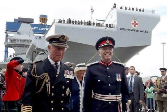 Prince Charles with his namesake HMS Prince of Wales. Picture: HMS Prince of Wales/ Royal Navy
