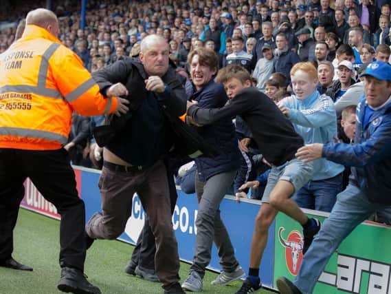 Fans on the pitch during the Pompey v Oldham match on September 30, 2017.