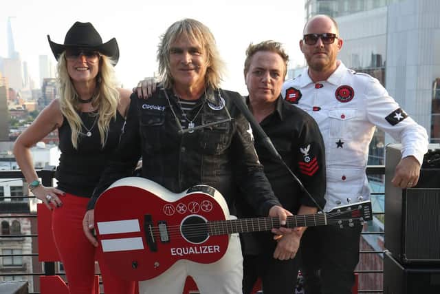 The Alarm play a roof top gig at the Live Nation building in New York, August 2018. Picture by Andy Labrow