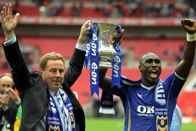 Harry Redknapp and Sol Campbell lift the cup on May 17, 2008. Picture: Steve Reid (082214-990)