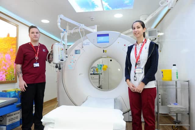 Lucas Merrett, radiology department assistant and Sara Martins, radiographer,  with the extra CT scanner.
Picture: Sarah Standing (180833-1256)