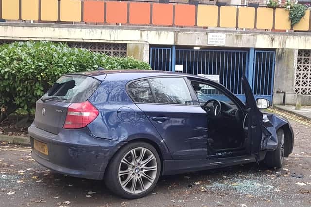 This BMW rammed into an unmarked police car multiple times
