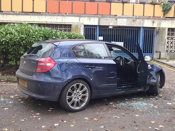 This BMW rammed into an unmarked police car multiple times