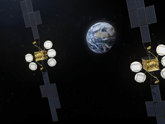 An artist's impression of the two Hotbird satellites workers will help build as part of the deal