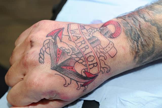 Halfway through the tattoo on John Barnard's hand.

Picture: Sarah Standing (180836-1365)