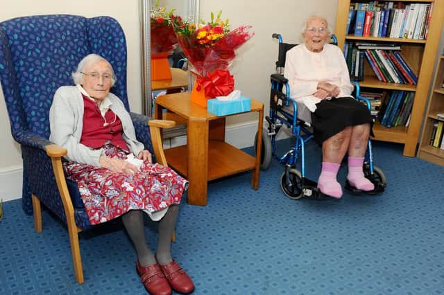May Edney (left) and Gladys Winkworth celebrated their milestone birthdays together at the Southlands Nursing Home in Havant. Picture: Sarah Standing (180829-91)