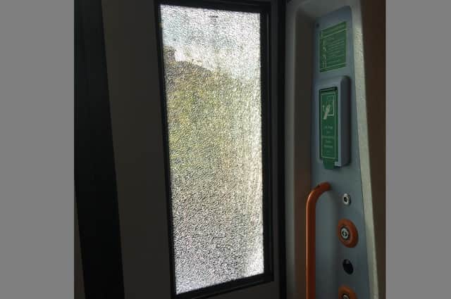 Teenage yobs smashed a train window at Hilsea train station on November 21 just before midday. Picture: Fiona Callingham