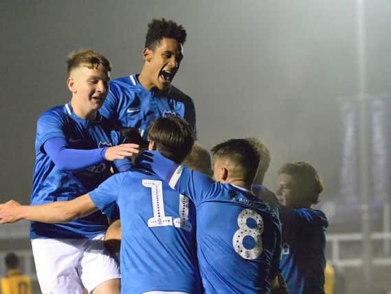 Pompey Academy celebrate Leon Maloney's penalty in their win at Cray Wanderers. Picture: Colin Farmery