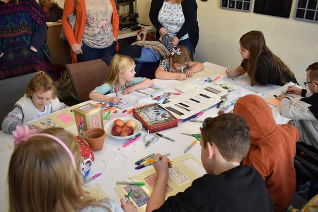 Youngsters make Christmas lanterns in The Crafty Makery, for the parade along West Street, Fareham